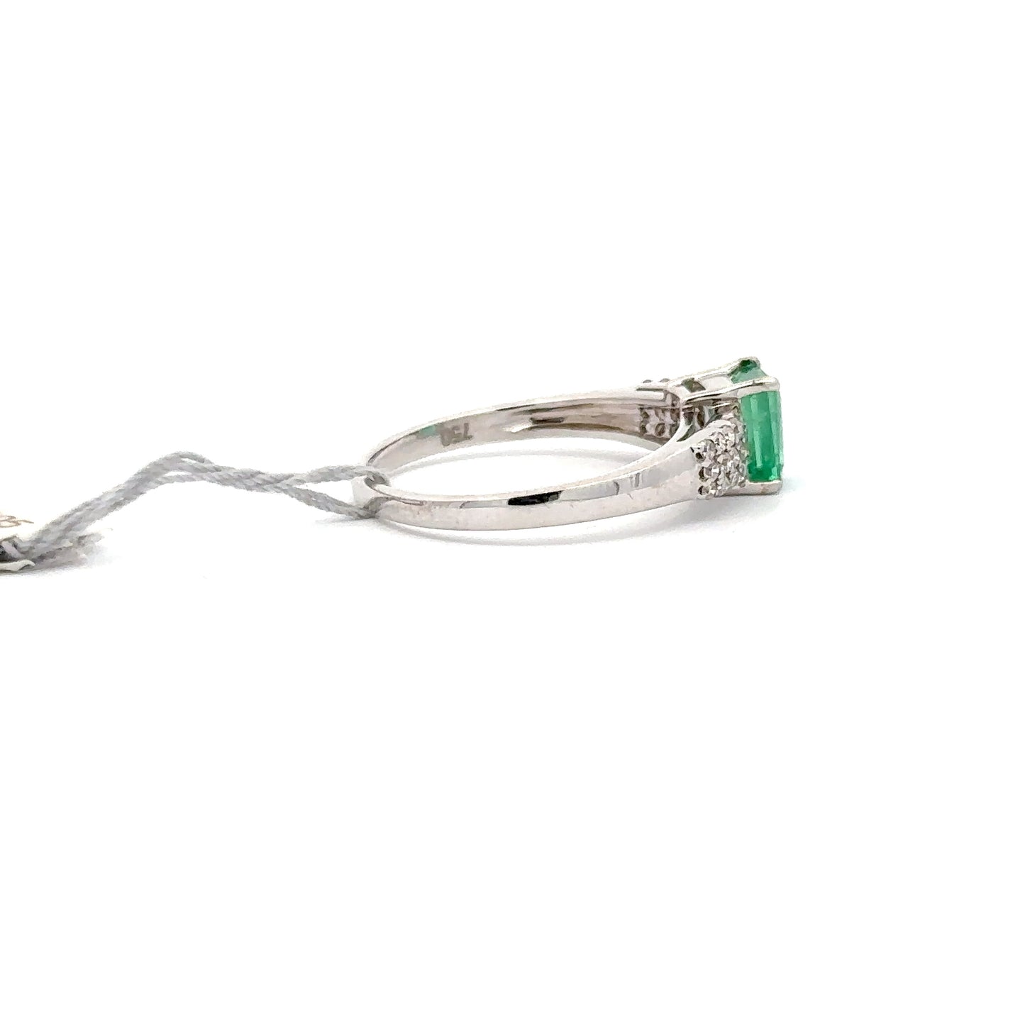 0.75 ct Natural Emerald Center | 0.25 ct Natural Side Diamonds | 18k White Gold.