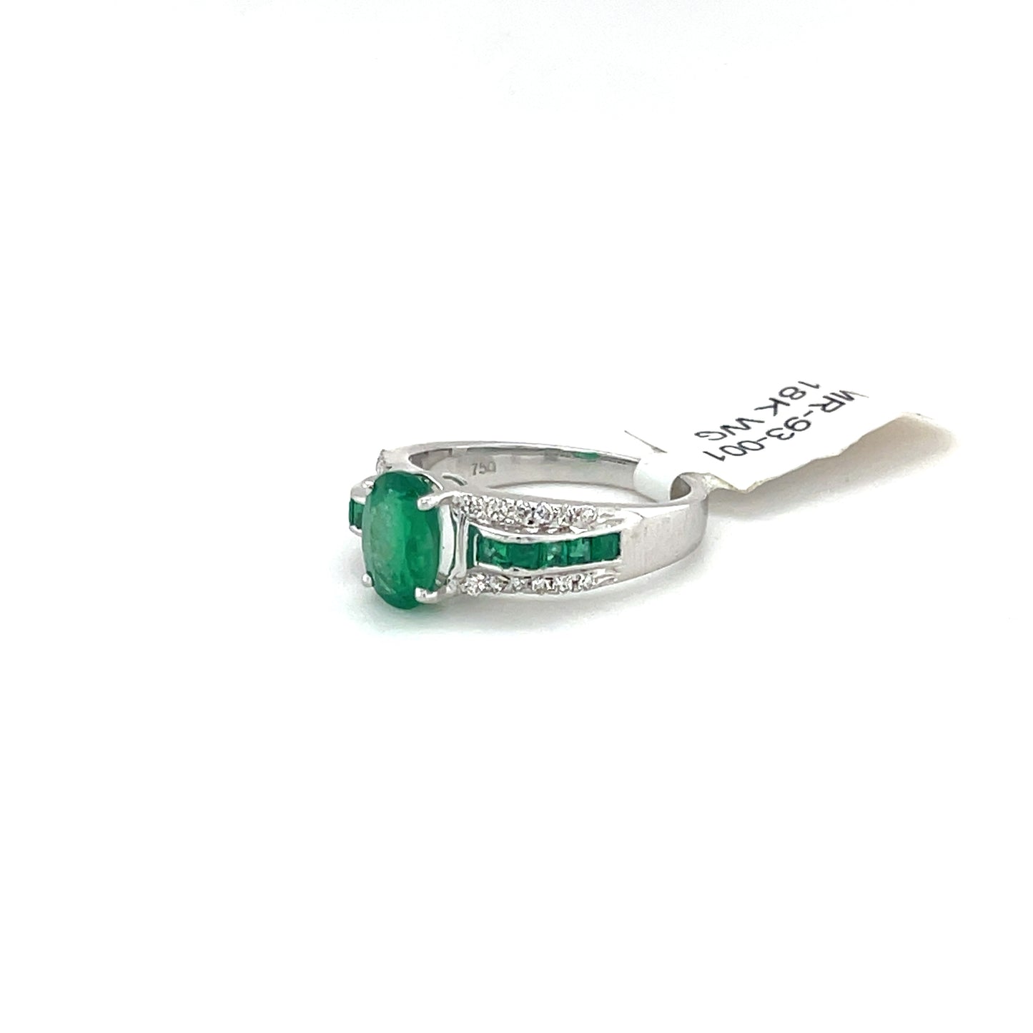 Beautiful Emerald Ring set in 18k White Gold with Round Diamonds.