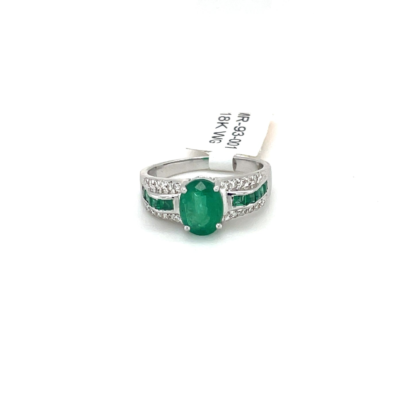 Beautiful Emerald Ring set in 18k White Gold with Round Diamonds.