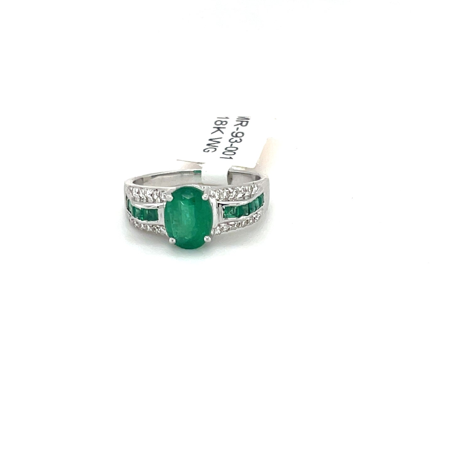 Beautiful Emerald Ring set in 18k White Gold with Round Diamonds.