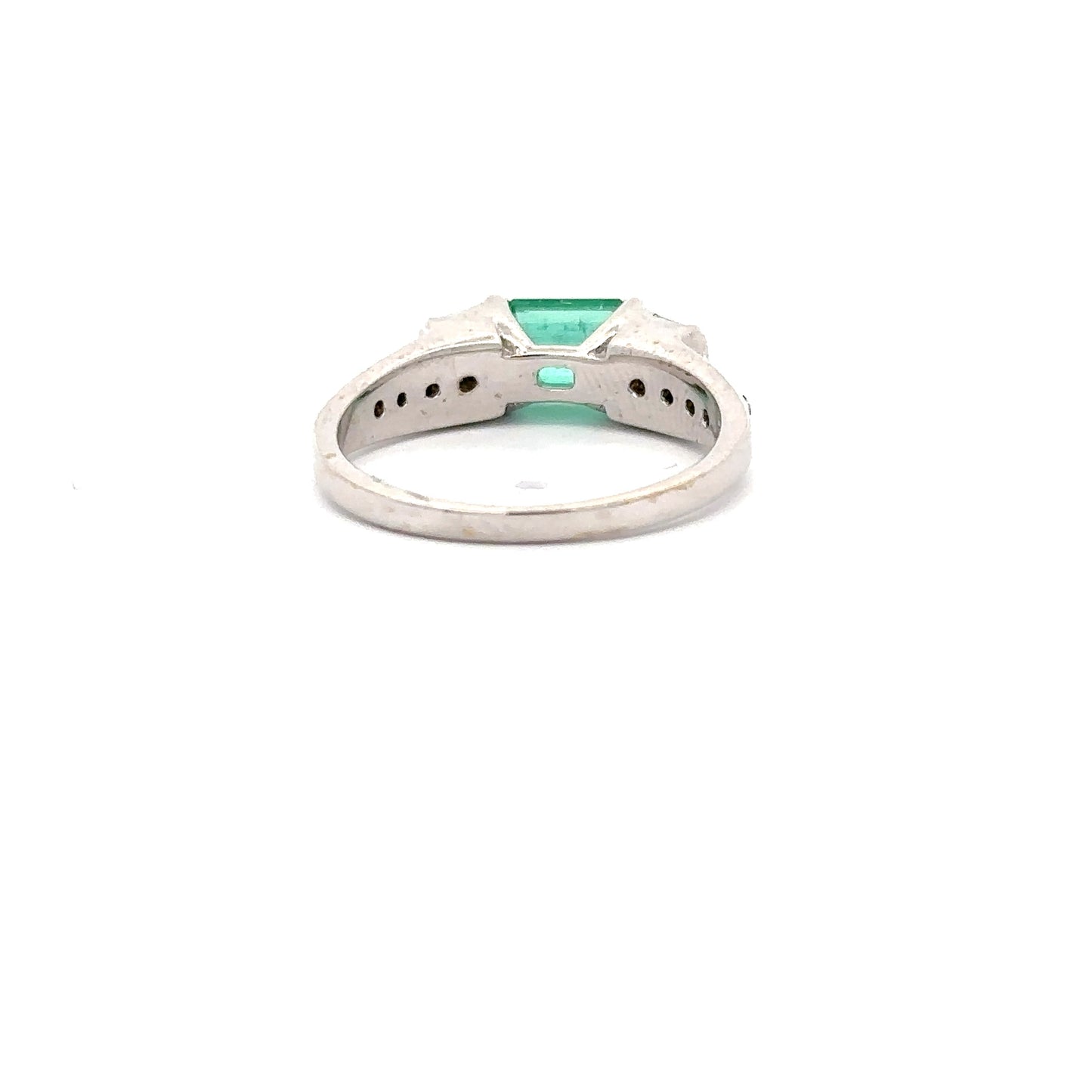 Beautiful Emerald Ring set in 18k White Gold With Baguette and Round Diamonds.