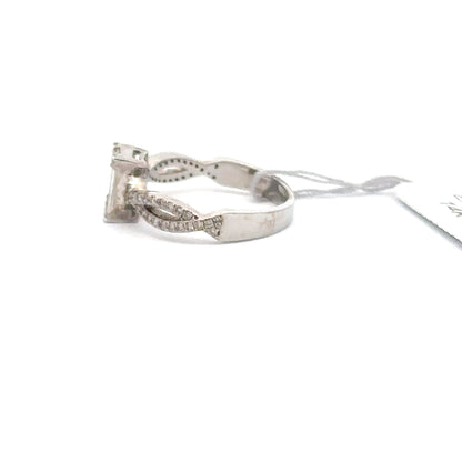14K WHITE GOLD | 0.70 CTW NATURAL DIAMOND RING.