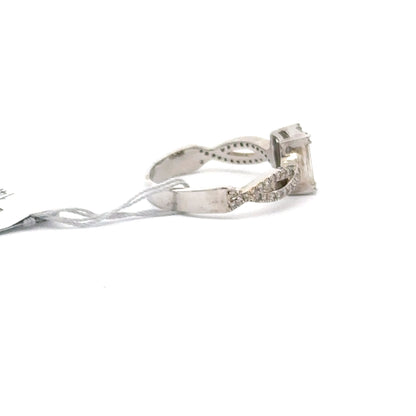 14K WHITE GOLD | 0.70 CTW NATURAL DIAMOND RING.