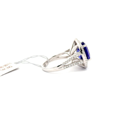 14K White GOLD | 6.69 CT TANZANITE CENTERED | 0.91 CT NATURAL DIAMONDS RING.