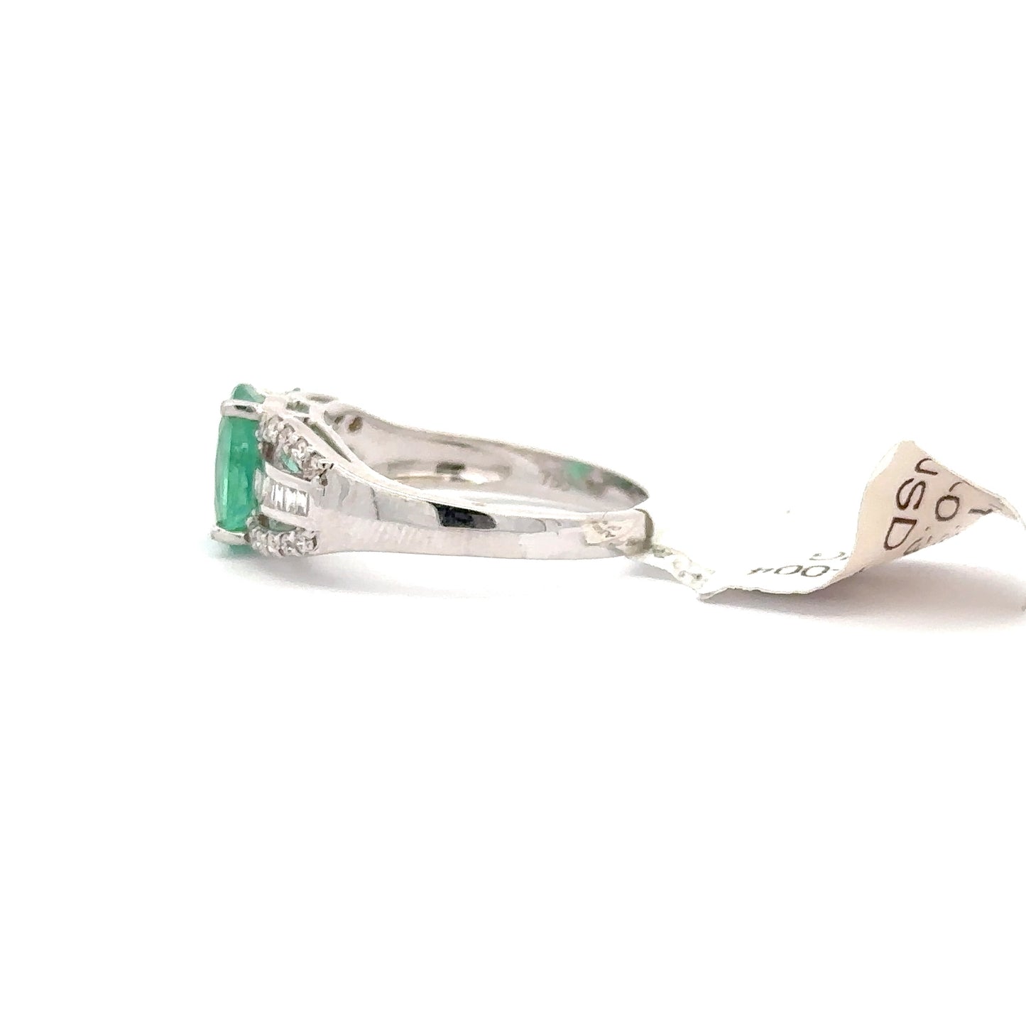 18K White Gold Oval Shape Emerald and Round/Baguette Shape Diamonds Ring.