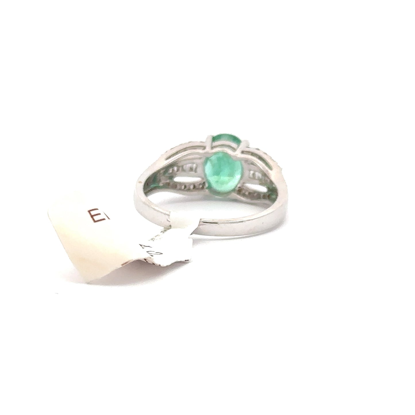 18K White Gold Oval Shape Emerald and Round/Baguette Shape Diamonds Ring.