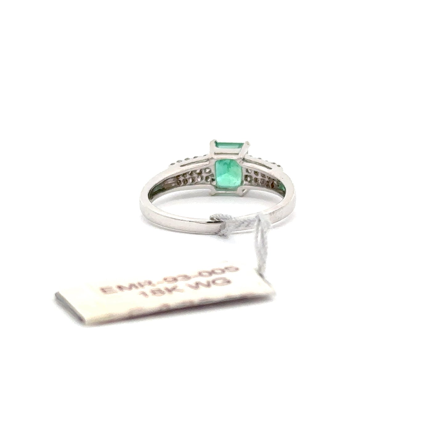 0.75 ct Natural Emerald Center | 0.25 ct Natural Side Diamonds | 18k White Gold.