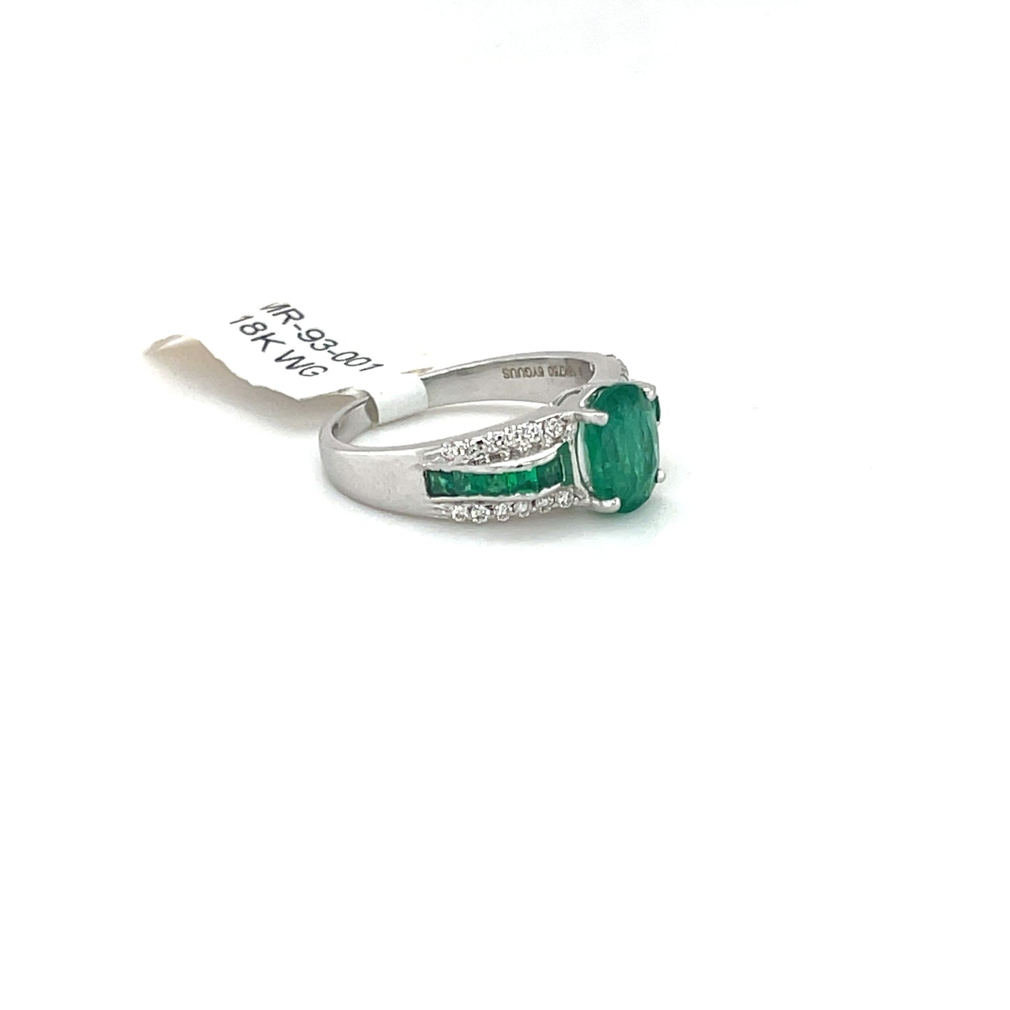 Beautiful Emerald Ring set in 18k White Gold with Round Diamonds.