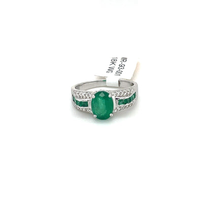 Beautiful Emerald Ring set in 18k White Gold with Round Diamonds.