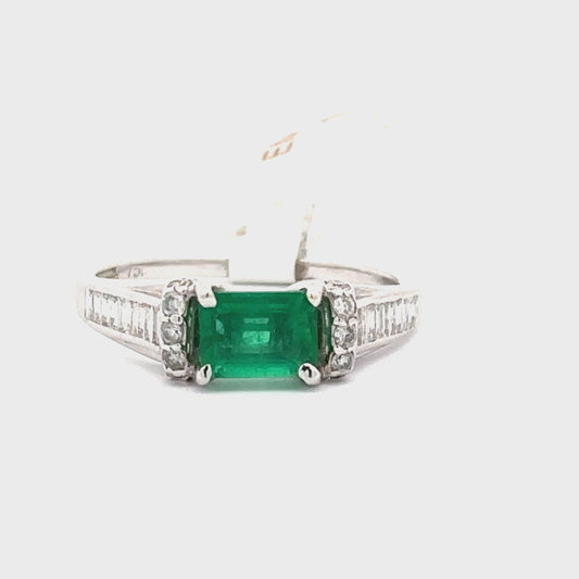18K WHITE GOLD | 0.94 CT NATURAL EMERALD | 0.29 CT NATURAL DIAMOND RING.