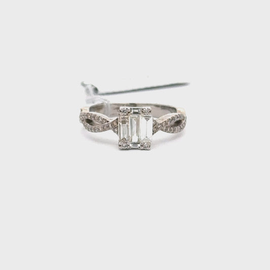 14K WHITE GOLD | 0.70 CTW NATURAL DIAMOND RING.