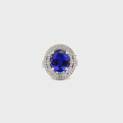 14K White GOLD | 6.69 CT TANZANITE CENTERED | 0.91 CT NATURAL DIAMONDS RING.