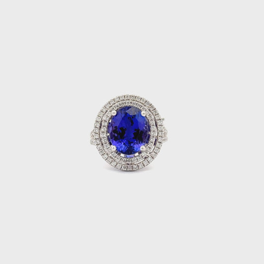 14K White GOLD | 6.69 CT TANZANITE CENTERED | 0.91 CT NATURAL DIAMONDS RING.