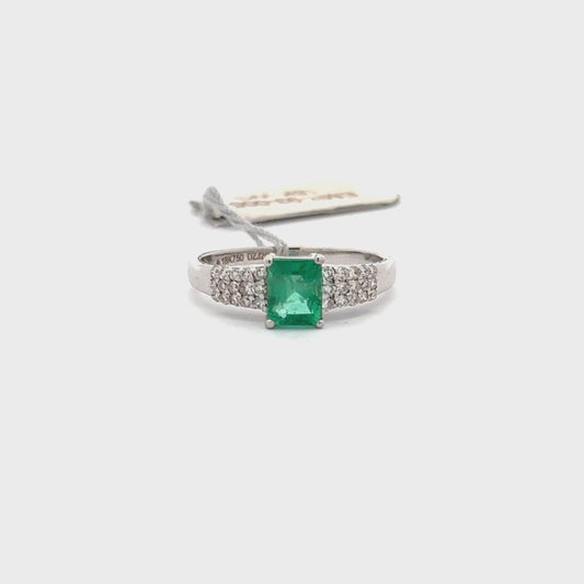 0.75 ct Natural Emerald Center | 0.25 ct Natural Side Diamonds | 18k White Gold.